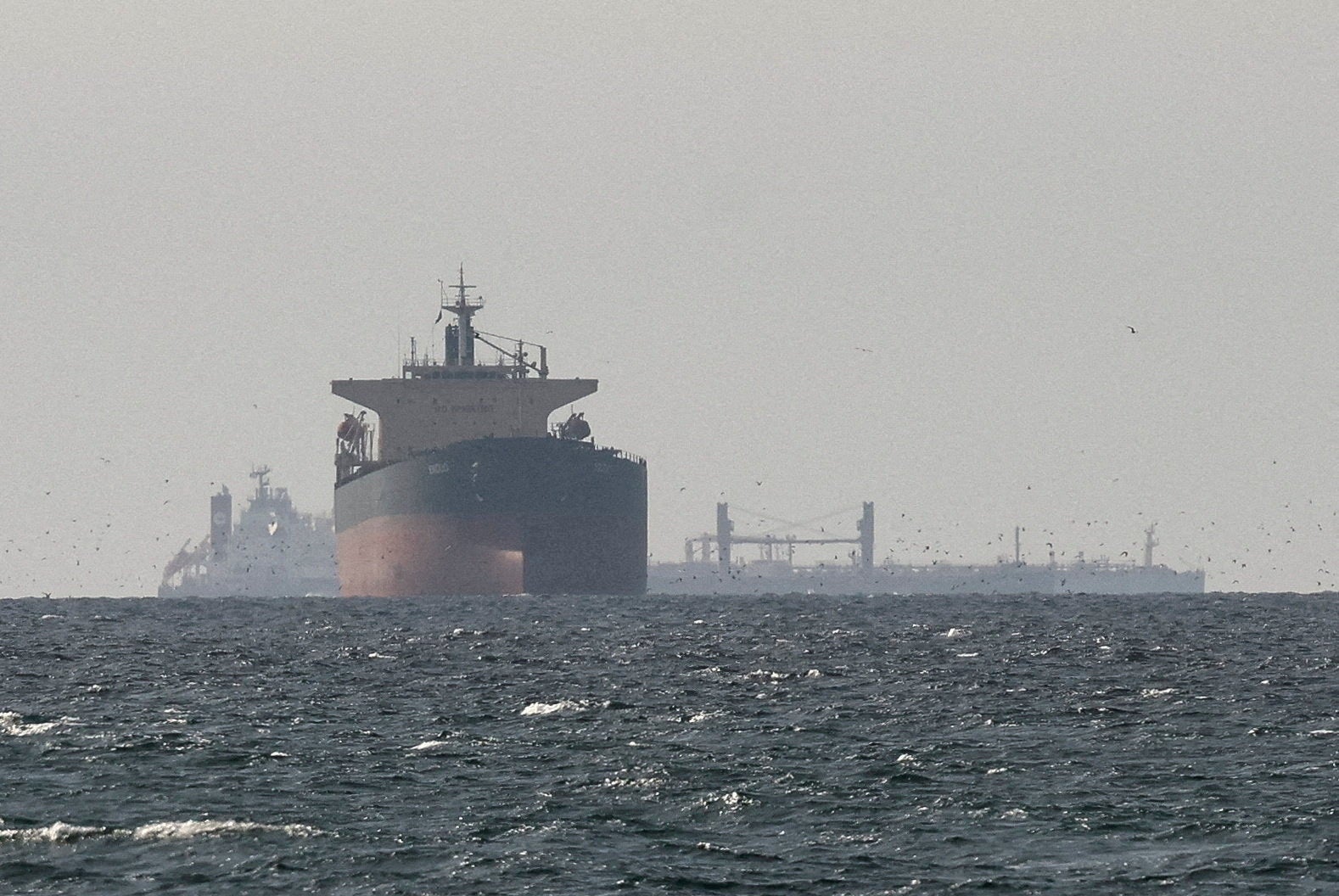 Cargo ships in the Gulf, near the Strait of Hormuz, as seen north of Ras al-Khaimah